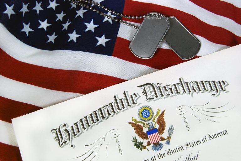 US Flag with Honorable Discharge Certificate.